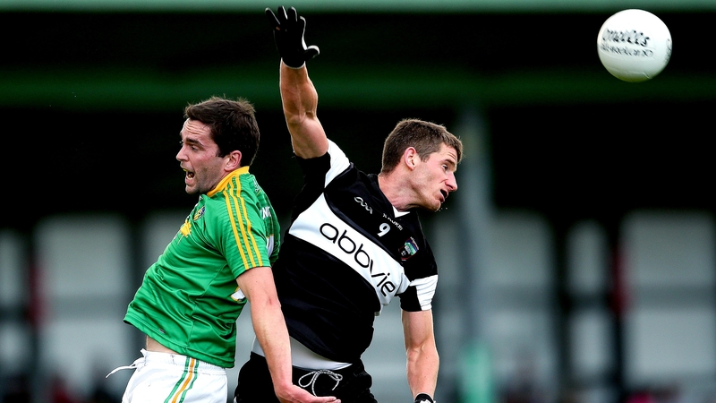 Leitrim’s Darren Sweeney and Adrian McIntyre of Sligo