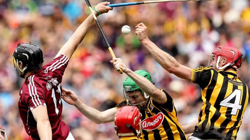 Kilkenny's Robert Lennon and Joey Holden battle with Joseph Cooney of Galway