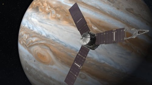 The storm looks like a churning red knot on the planet's surface