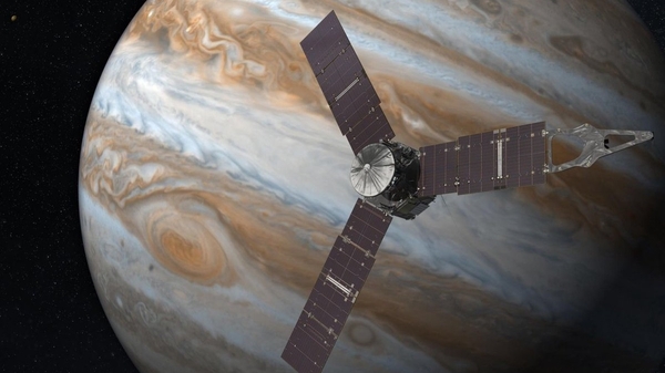 The storm looks like a churning red knot on the planet's surface