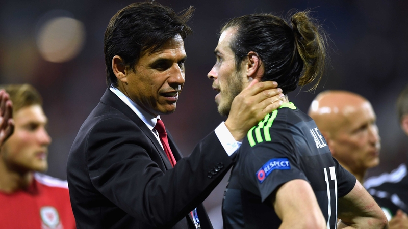 Wales manager Chris Coleman consoles Gareth Bale after the full-time whistle in Lyon