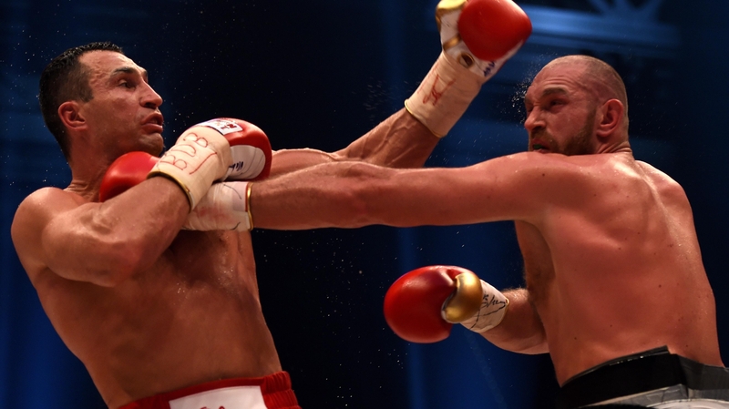 Wladimir Klitschko (L) of Ukraine will face off again with Britain's Tyson Fury
