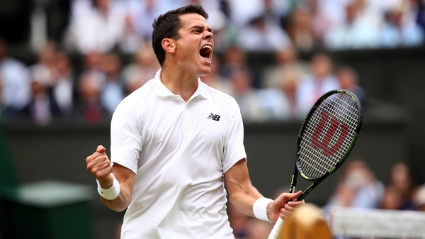 Milos Raonic celebrates his historic win on Centre Court