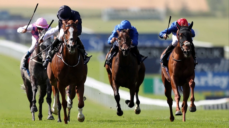 Alice Springs (navy silks) powers away from her rivals on the July Course