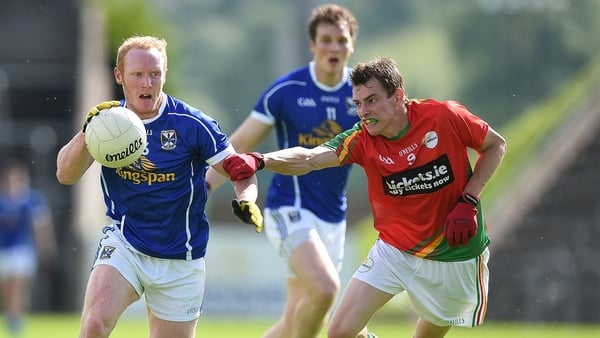 Cian Mackey in possession against Carlow's Sean Gannon