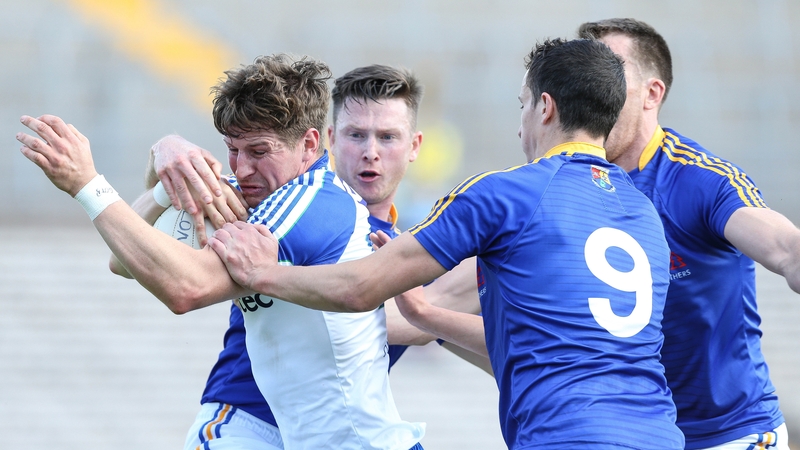 Monaghan's Darren Hughes is surrounded by Michael Quinn, Michael Brady and Darren Gallagher