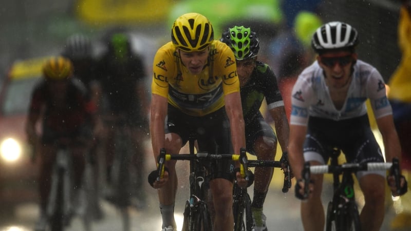 Froome crosses the line, just two seconds ahead of Ireland's Dan Martin