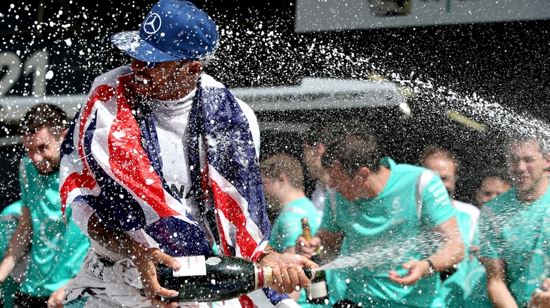 Lewis Hamilton celebrates his British GP victory