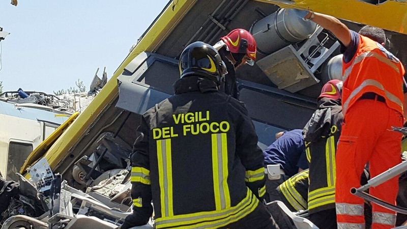 Rescue workers at the scene of the collision