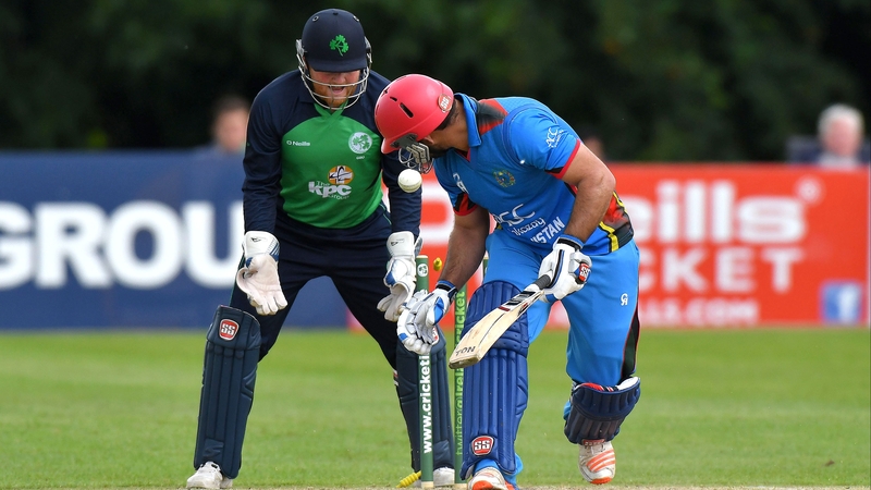 Afghanistan's Samiullah Shinwari watches the bails tumble