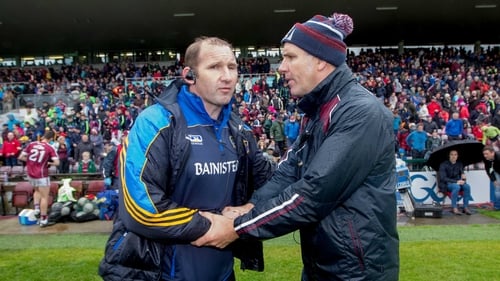 Roscommon joint-manager Fergal O'Donnel and Galway boss Kevin Walsh after last weekend's damp draw