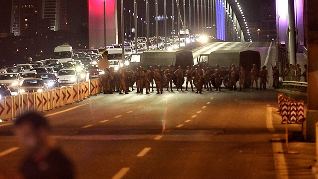 Turkish soldiers block the Bosphorus bridge in Istanbul
