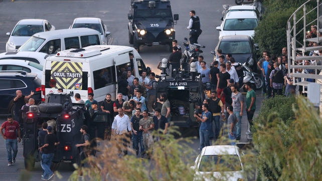 Turkish police arrest Turkish soldiers at the Taksim Square
