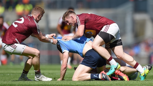 Ray Connellan and Kieran Martin with Diarmuid Connolly during the Leinster SFC final