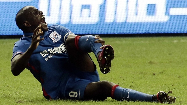 Demba Ba writhes in pain after breaking his leg