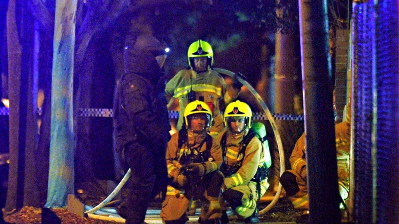 Bomb squad and emergency services at the scene