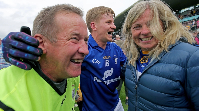 Clare's Podge Collins (centre) celebrates with his father Colm and mother Katherine