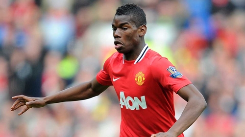 Paul Pogba will be back in the red of Man United this season