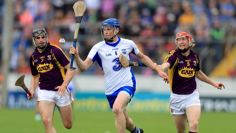 Waterford's Austin Gleeson is pursued by Eanna Martin and Diarmuid O'Keeffe