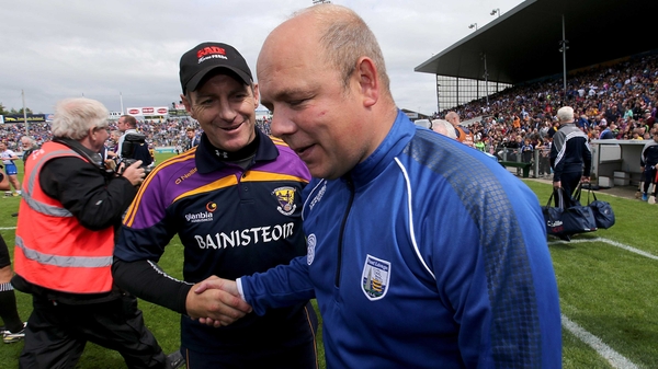 Vanquished Wexford manager Liam Dunne congratulates Derek McGrath after the game