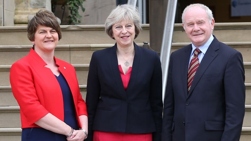 Theresa May is greeted by First Minister Arlene Foster and Deputy First Minister Martin McGuinness at Stormont Castle