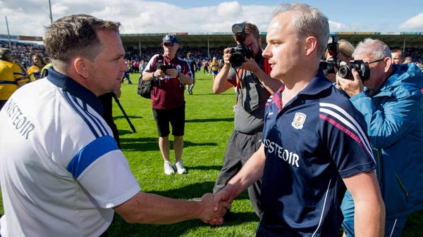 Davy Fitzgerald (L) congratulates Micheál Donoghue