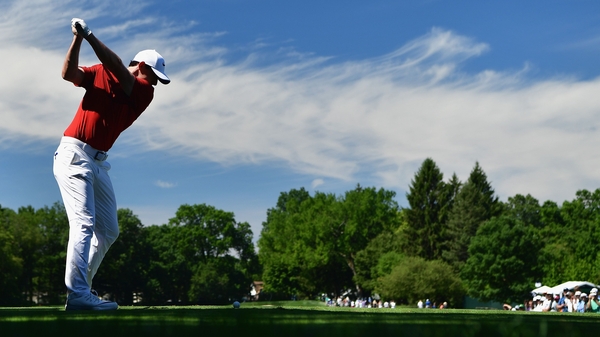 Rory McIlroy hits a tee shot during a practice round at Baltusrol Golf Club