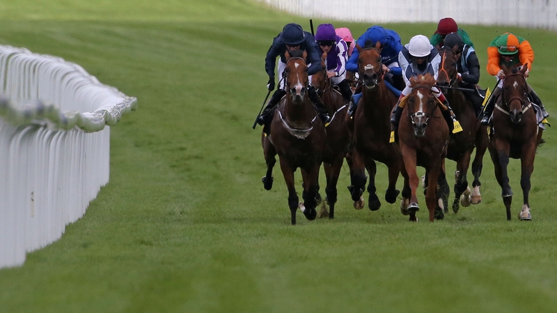 Andrea Atzeni riding Ulysses (C, white cap) wins The BeringIce Gordon Stakes