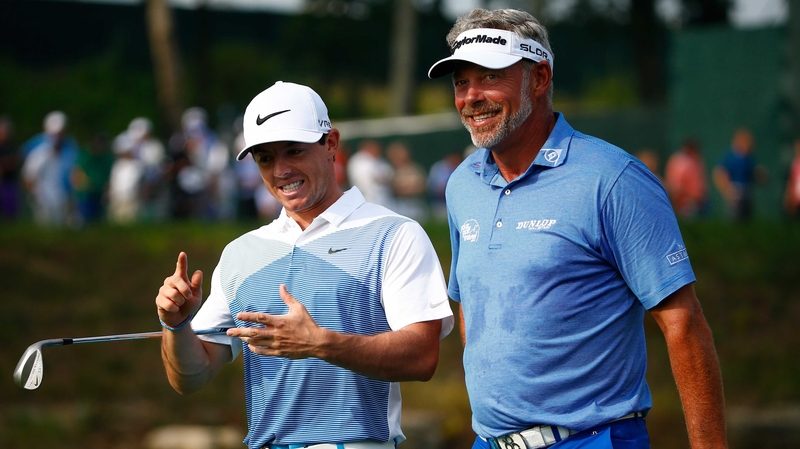Darren Clarke (R) with Rory McIlroy