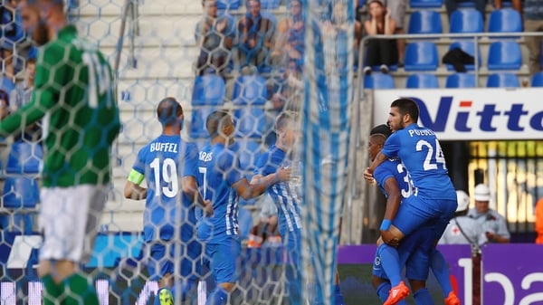 Leon Bailey celebrates with team-mates after his first-half goal
