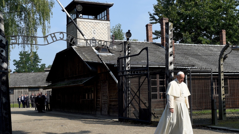 Pope Francis walks through the 'Arbeit macht Frei' main gate at Auschwitz