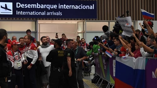 The Russian Olympic team are greeted upon their arrival in Rio de Janeiro