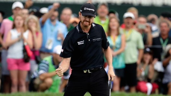 Walker celebrates another key putt in his final round