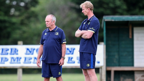 Graham Henry and Leo Cullen cast their eyes over the Leinster squad during a practice session in Greystones