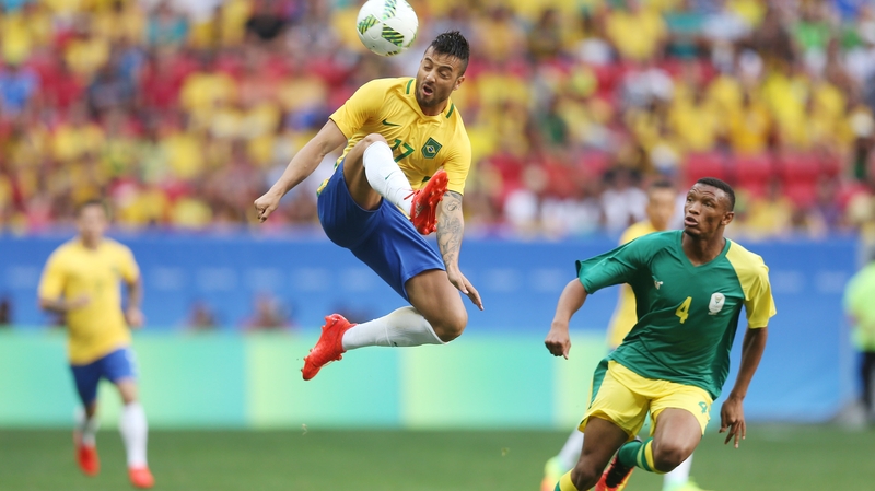 Feipe Anderson of Brazil leaps high to control the ball