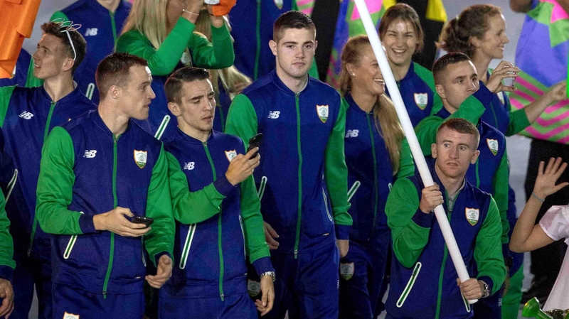 Paddy Barnes holds the flag at the opening ceremony in Rio