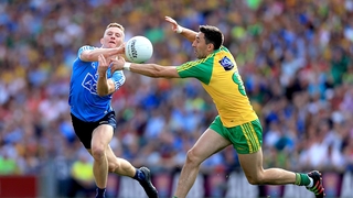 Dublin's Ciaran Kilkenny with Rory Kavanagh of Donegal