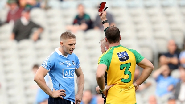 Eoghan O'Gara is shown a red card