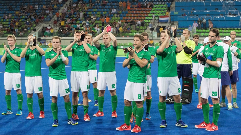 The Irish players applaud the crowd after the game