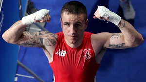 David Oliver Joyce shows off the guns after his progression in the 60kg (lightweight) division. He beat Andrique Allisop from the Seychelles
