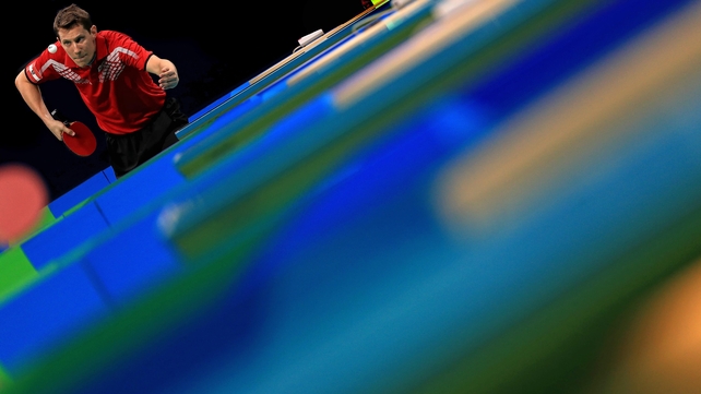 Table manners - Austrian Robert Gardos in action against Ovidiu Ionescu of Romania