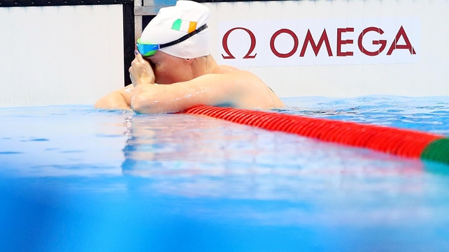 Fiona Doyle cuts a disconsolate figure after she finished outside the top 16 in 20th to miss out on the semi-finals of the 100m breaststroke