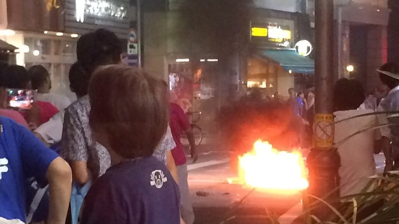 Several hand-made fire bombs were thrown from a nearby apartment building