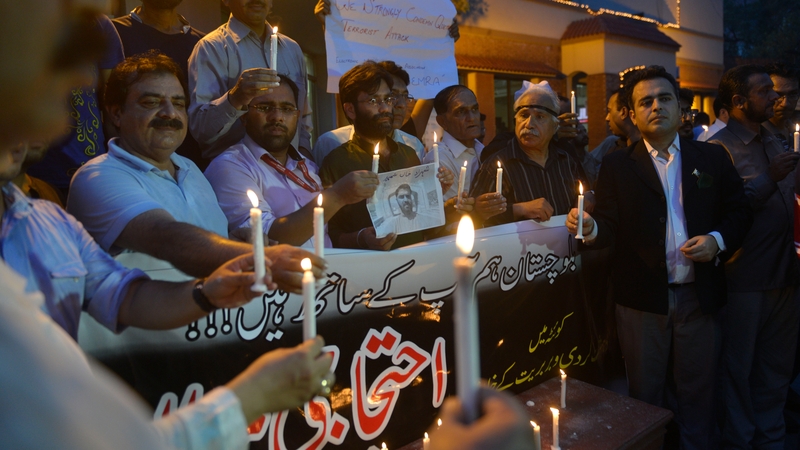 Journalists pay tribute to their colleagues who were killed in the bombing