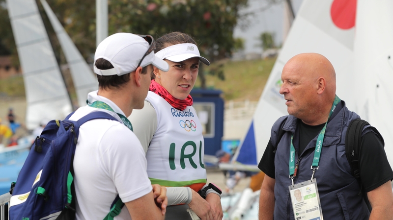 Annalise Murphy with her two coaches after Tuesday's races