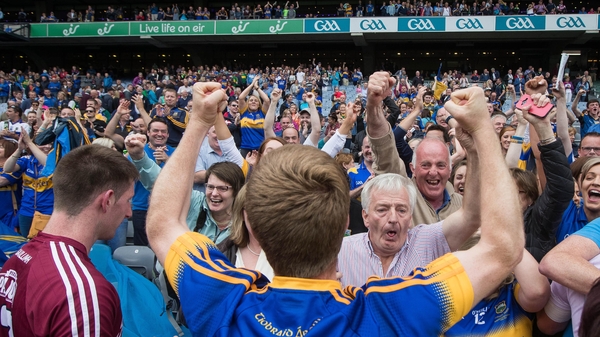 Tipp fans cheer on their footballers after beating Galway