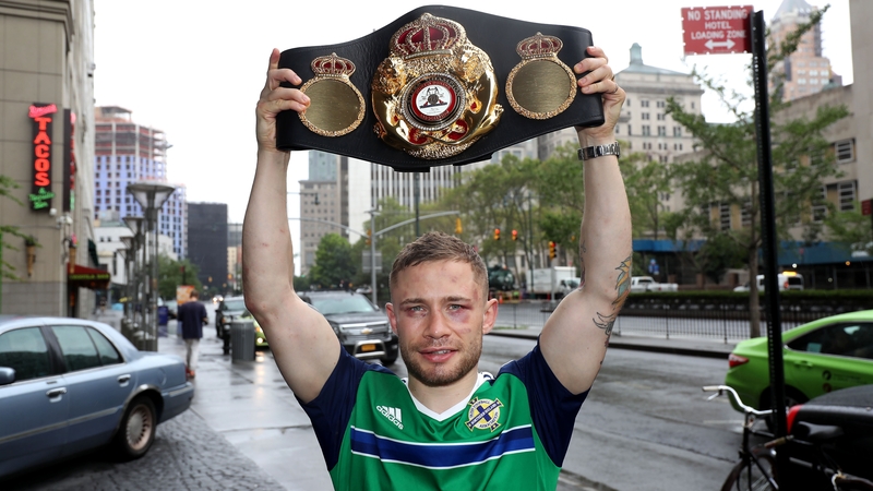 Carl Frampton shows off his WBA belt in New York city