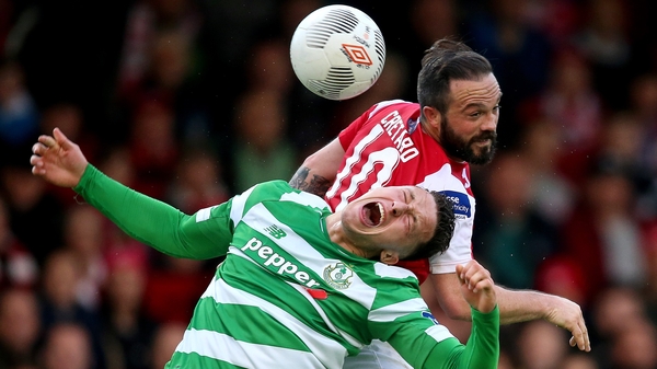 Shamrock Rovers' Robert Cornwall feels the challenge of Raffaele Cretaro
