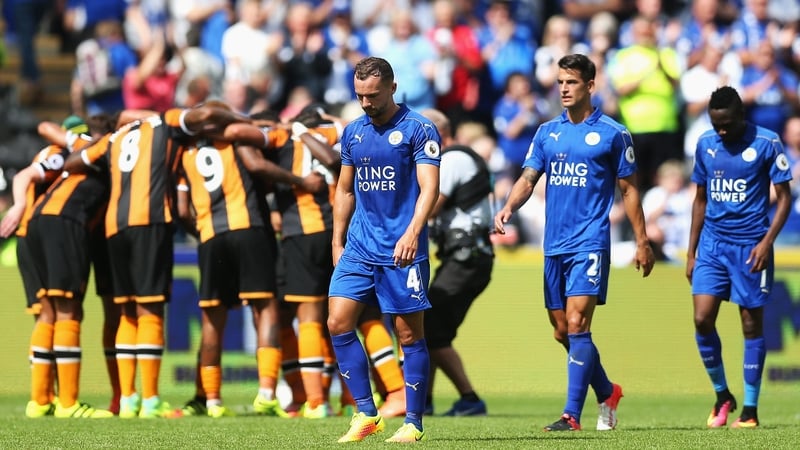 Leicester players leave the field dejected following defeat