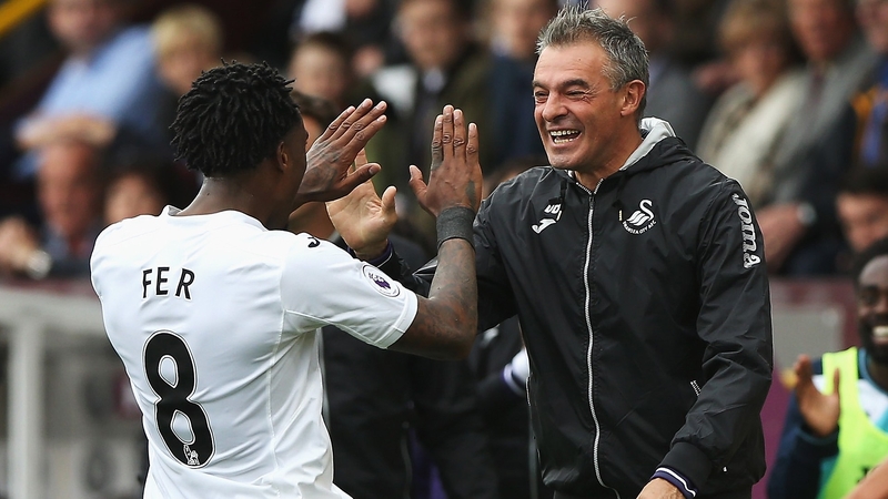 Leroy Fer celebrates with manager Francesco Guidolin
